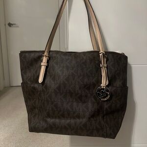 Michael Kors tote bag and wallet.